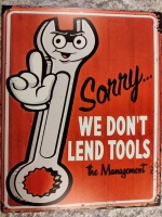 metalen_wandbord_rood_tekst_sorry_we_do_not_lend_tools
